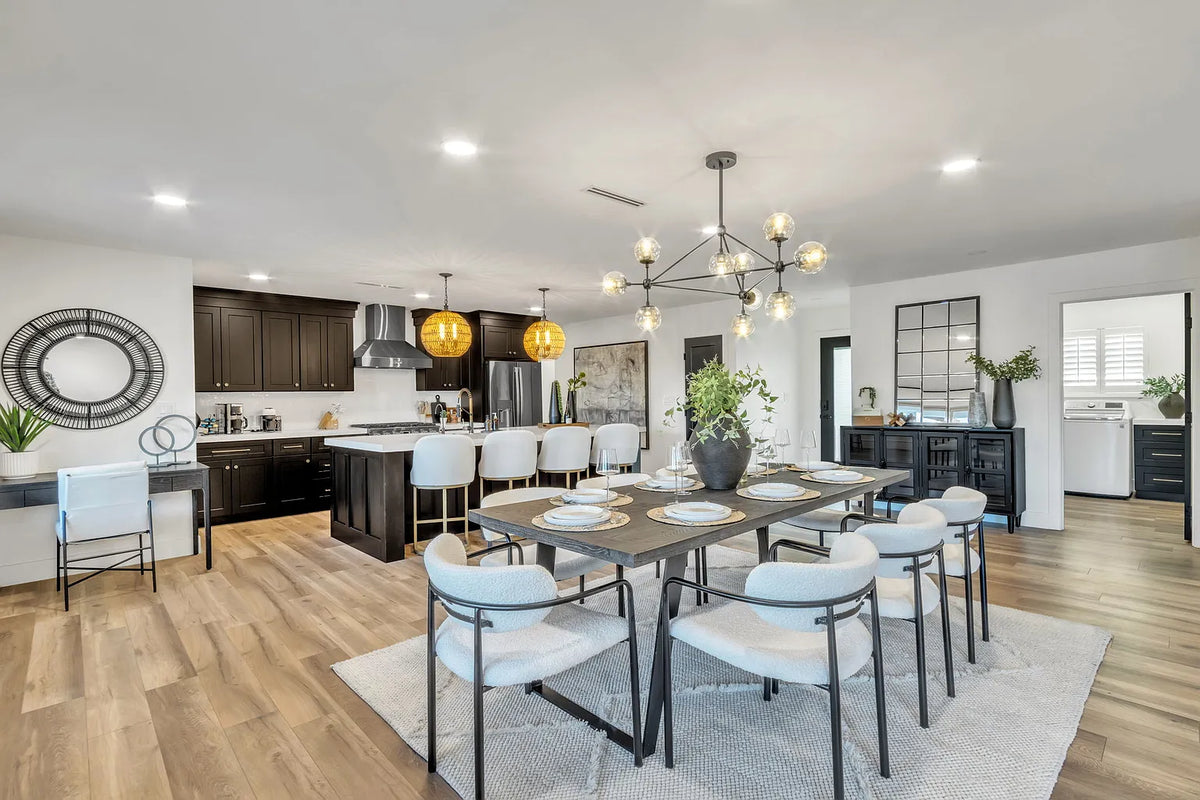 Kitchen island pendant and recessed lighting in completed kitchen remodel
